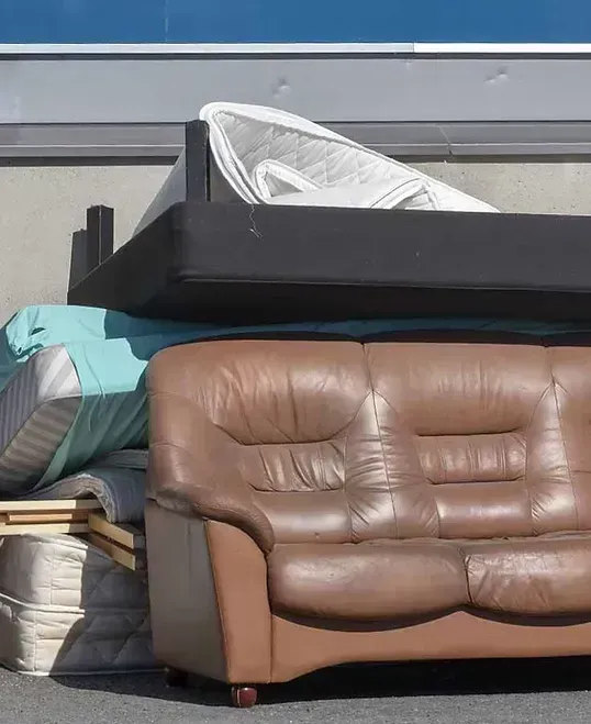 Sofa and bulky furniture set aside for disposal